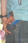 flashing a small penis in his shorts