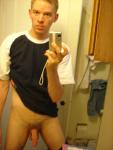 semi erect penis while wearing a shirt