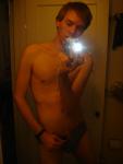 Flashing his penis in the mirror