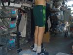 Green Nike swim trunks, back side