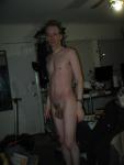 Standing nude with glasses