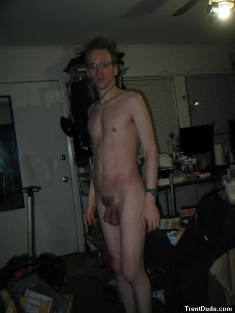 Standing nude with glasses