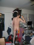 Standing Nude doing luandry
