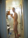 In the bathroom about to shower