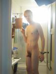 In the bathroom about to shower