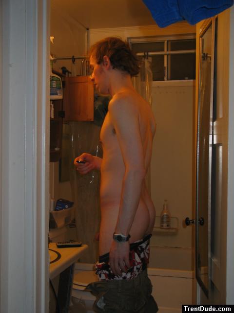 In the bathroom about to shower in the morning while dark out