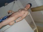 Hanging a swim brief in a convenient place during the shower