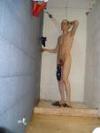 Swim brief hanging from the glans head on his penis