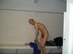 Getting into a swim brief before playing water polo