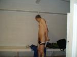 Getting into a swim brief before playing water polo