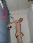 Removing black/white swim brief in the shower