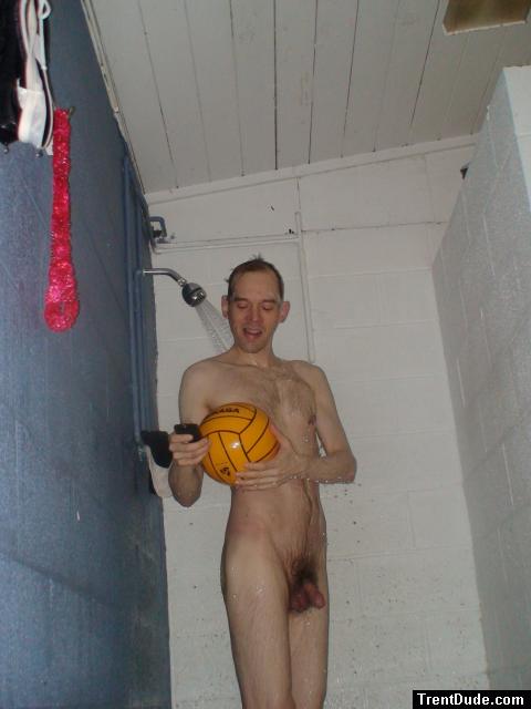 Nude in shower with a water polo ball