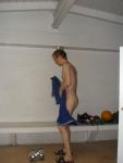 Drying off after shower, water polo ball on the bench