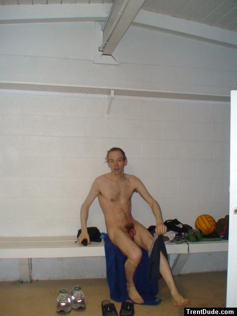 Drying off after shower, water polo ball on the bench