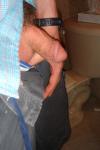 Flaccid penis that looks as thick as his arm.