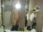 skinny in a hotel bathroom