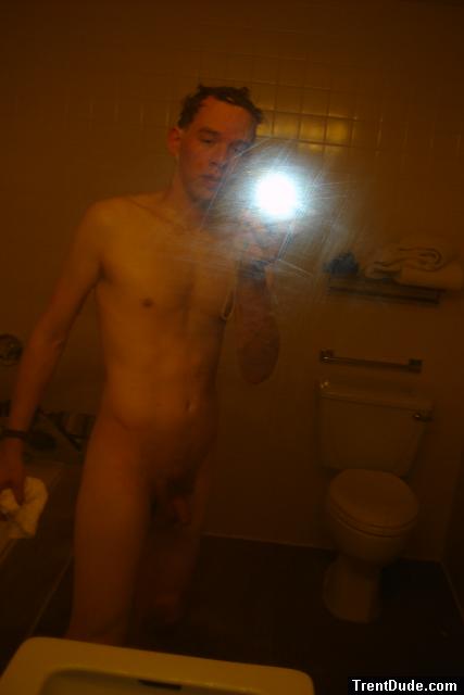 Nude in a hotel bathroom mirror, after shower
