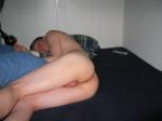 It looks like he is dreaming about chocolate cake!