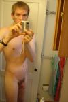 blond nude in mirror