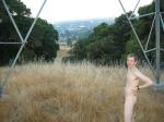 Naked outdoors  - electrical tower in the mountains!