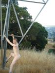 Naked outdoors - climbing the electrical tower