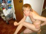 Hanging between his legs
