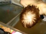 Photo flash makes it look bald.