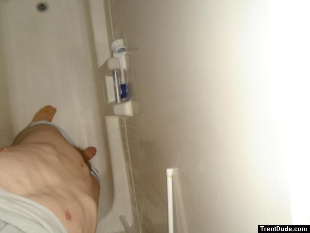 Undressing in the shower.