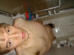 clean face in shower