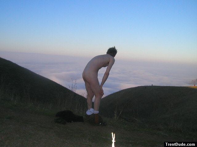Checking out the clouds with underwear at ankles (rear)