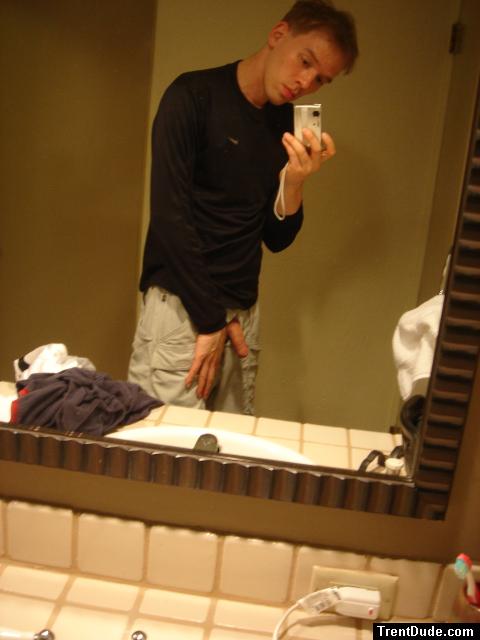 showing his penis in the mirror