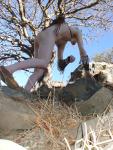 Rock climbing in the nude