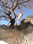 Nude rock climber
