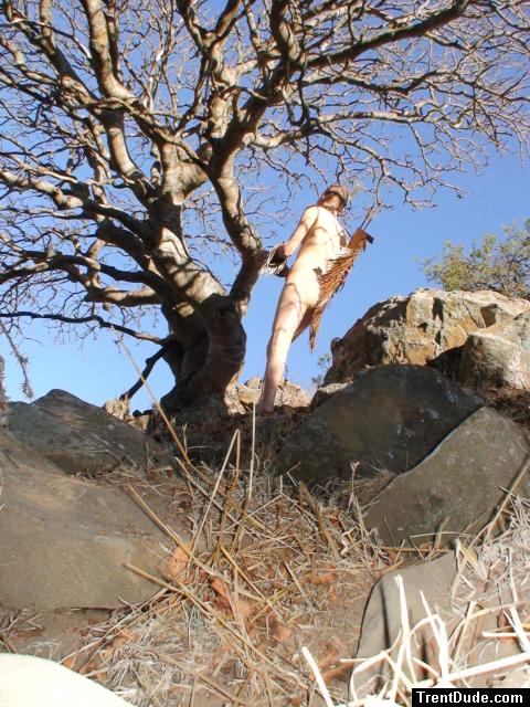 Nude rock climber