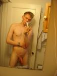 Long semi-hard penis in mirror