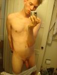 Long semi-hard penis in mirror