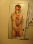 Long semi-hard penis in mirror