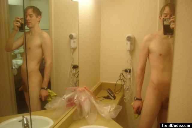 Nude in two mirror bathroom