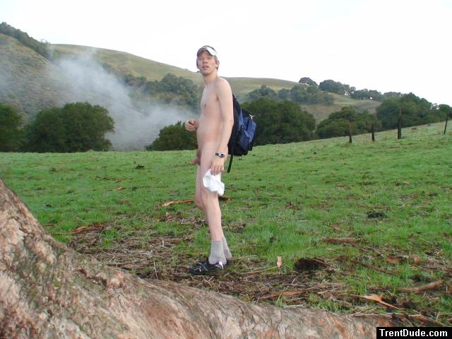 nude with backpack in the clouds