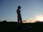Nude dude standing at sunrise