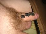 flaccid penis and a dime, nickle, quarter
