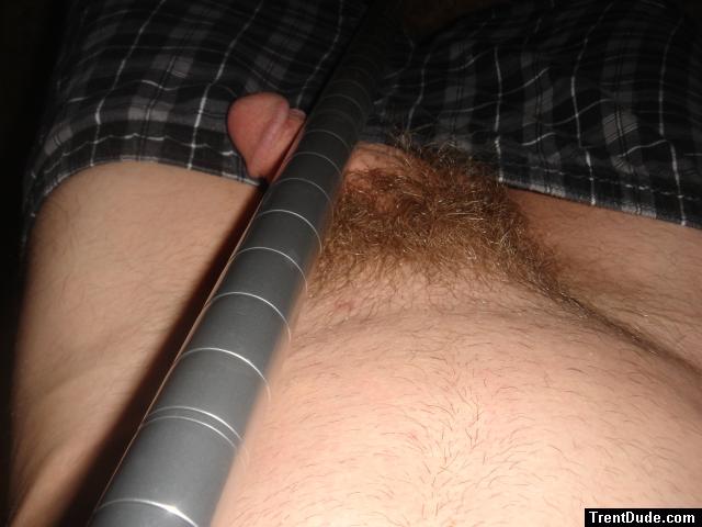 Wrapping his penis around a pole