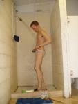 Removing white speedo in the shower (checking the inside)