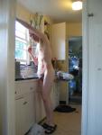 Nude in the messy kitchen (armpit)