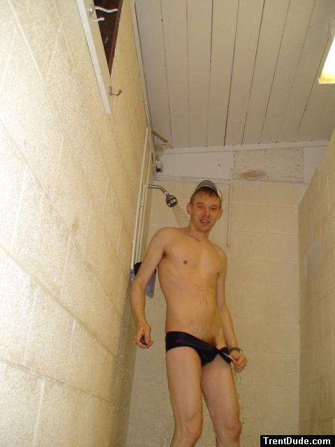 undressing from a  Blue/Red stripes swim brief