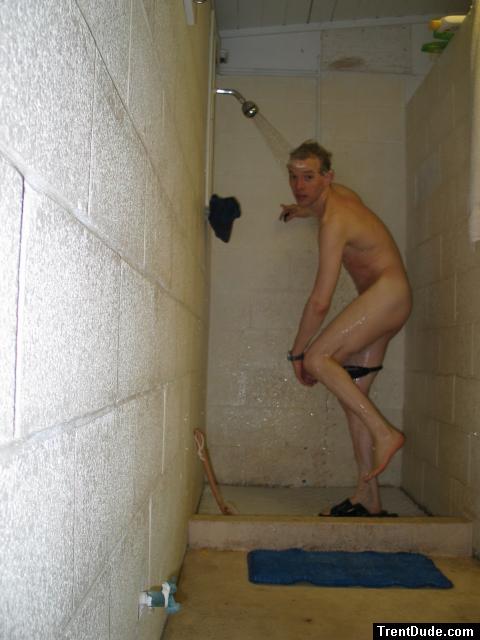 Pulling off his swim suit - hope the team doesn't come in