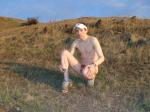 Watching the sun rise on the farm in the nude
