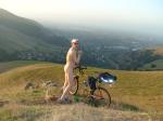 His butt hurts from riding the bicycle nude!