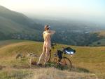 Where should he place his butt on the bicycle seat?