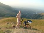 A nude biker on a hill!